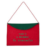 Red envelope with "make it a december to remember" printed in green