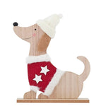 Wooden ornament of a sitting dog wearing a red jumper with white stars