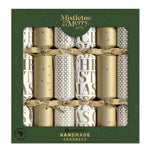 Christmas Crackers with assorted patterns in a gold and white colour scheme
