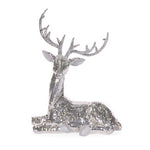 Lying disco reindeer, covered in mirror tiles