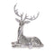 Lying disco reindeer, covered in mirror tiles