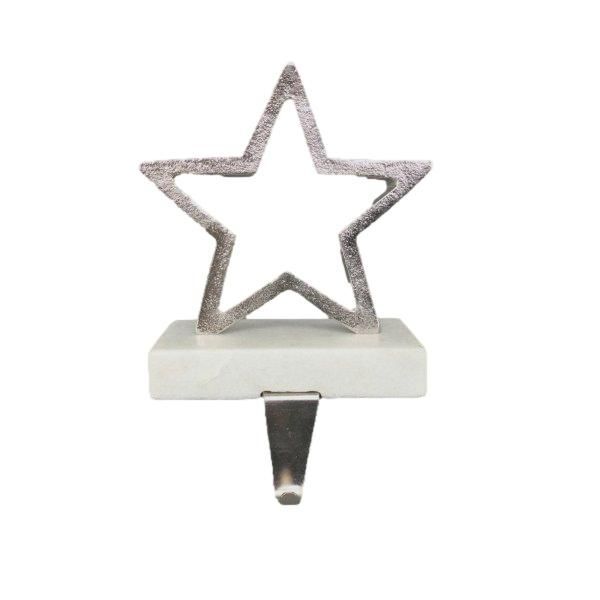 Star ornament attached to block with hook to hang Christmas stockings from
