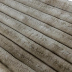 Faux fur tree skirt in a natural colour and ribbed pattern