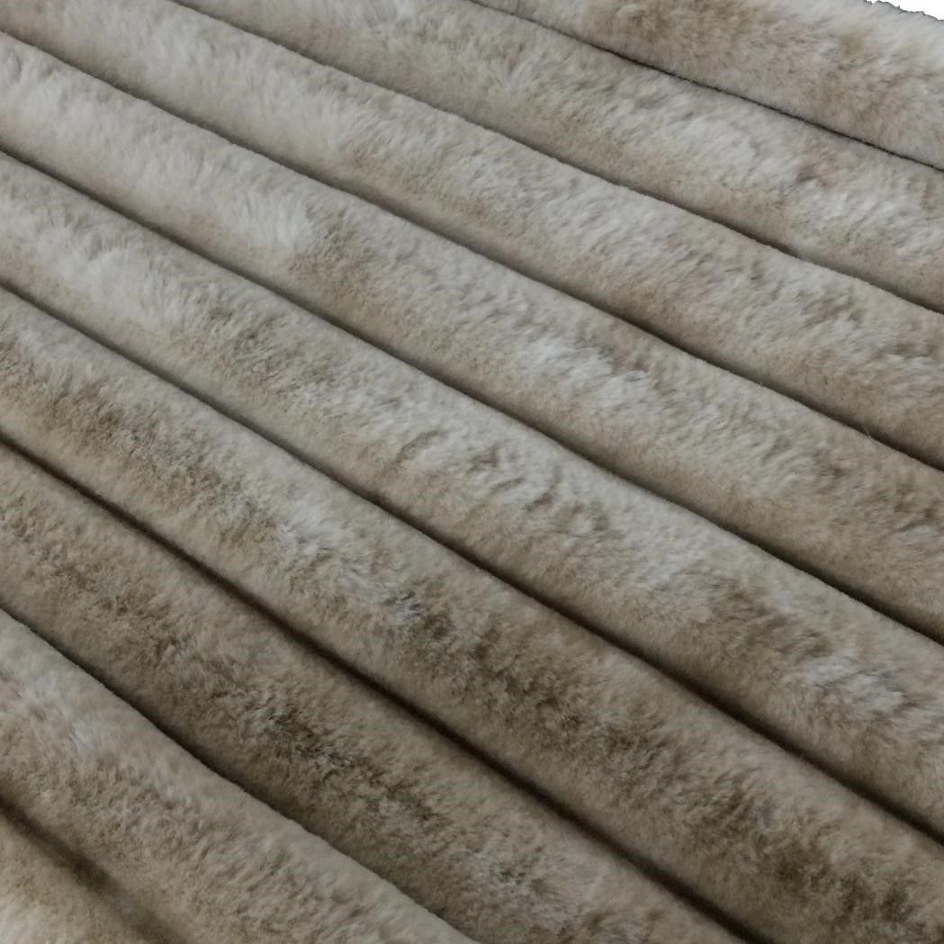 Faux fur tree skirt in a natural colour and ribbed pattern