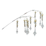 Decorative spray with hanging strands of pearls and crystals