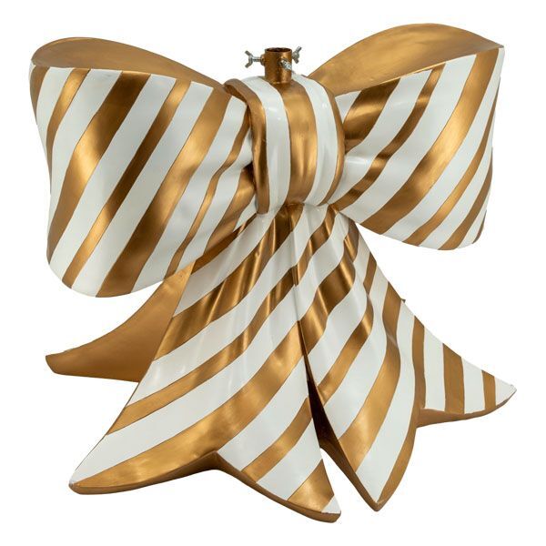 Tree stand in the shape of a gold and white striped bow