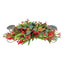 Decorative candle holder, holds three candles, adorned with faux foliage, red berries and gold pinecones