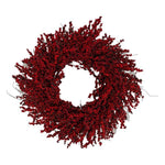 Decorative wreath made of faux red berries