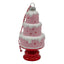Pink cake with white icing, red spots and on a red stand, hanging ornament