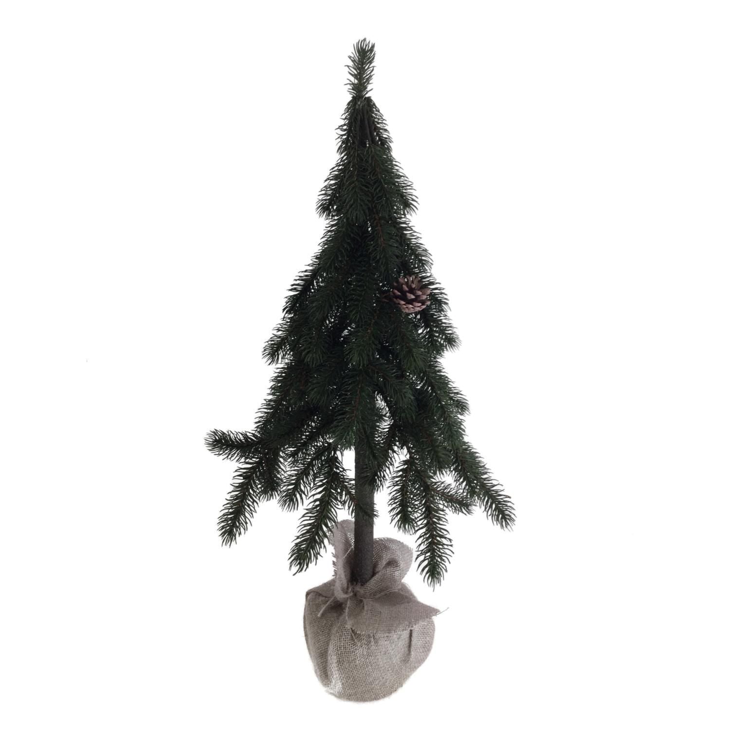 Green pine Christmas tree with burlap base